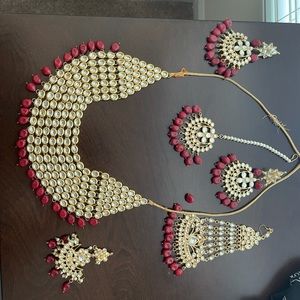 Beautiful earrings side tikka necklace set.